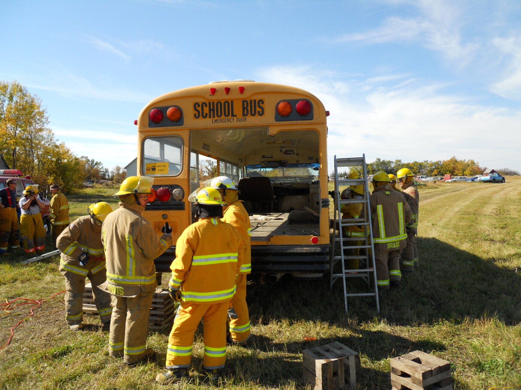 firefighters near school bus